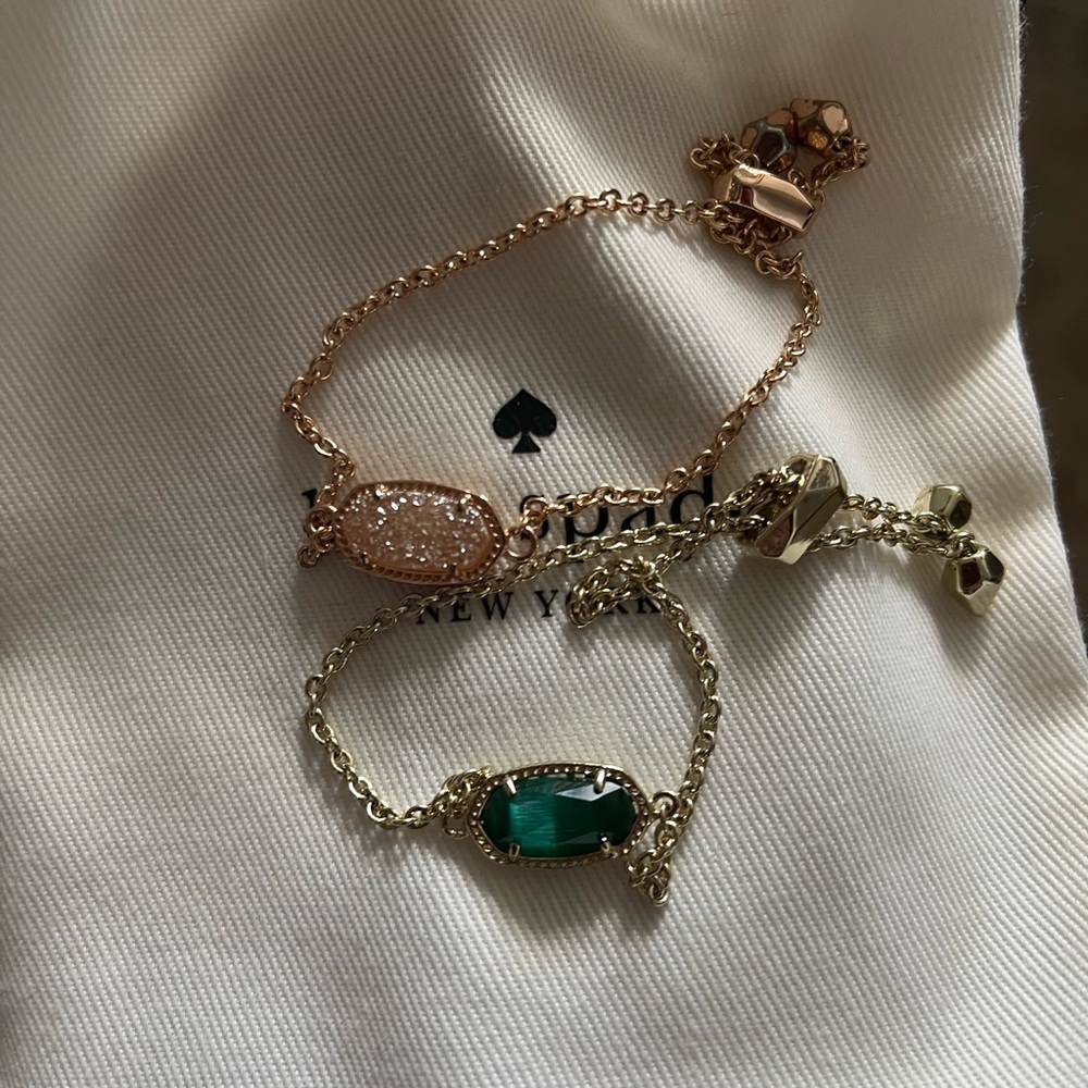 Kate Spade adjustable bracelets, one in sparkly pink, and the other in emerald
